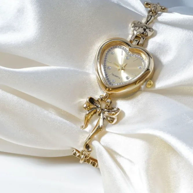Retro Heart Bracelet Watch Women Gold Bow Flower Fashion Vintage Quartz Wrist Watch Hot Sale view 3