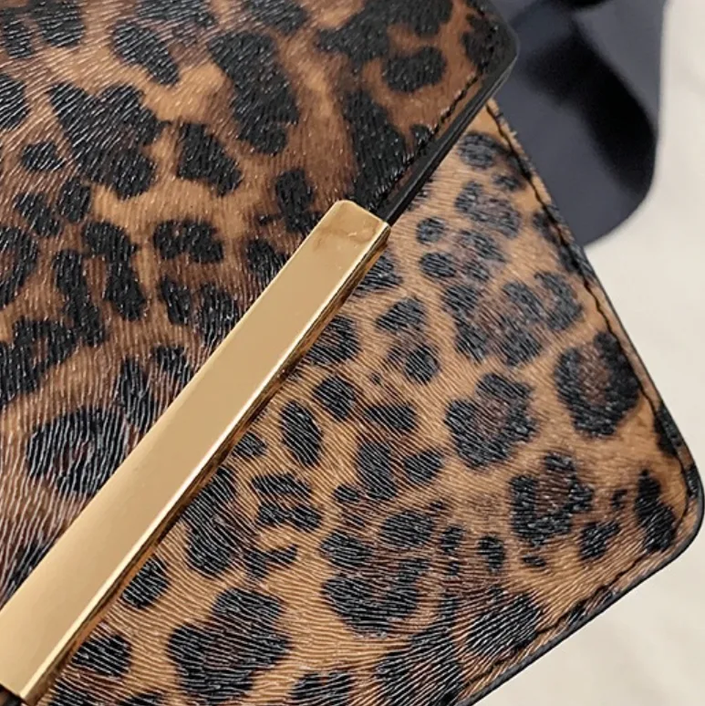 Leopard Print PU Leather Mini Top Handle Bag Envelope Style Crossbody Purse with Gold Bar Detail view 3