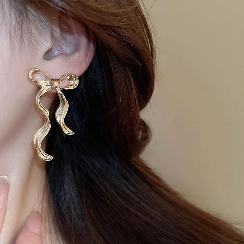 Wholesale Earrings Fashionable and Beautiful Silver Needle Stripe Long Bow Earrings Classic Luxury Jewelry for Women view 3